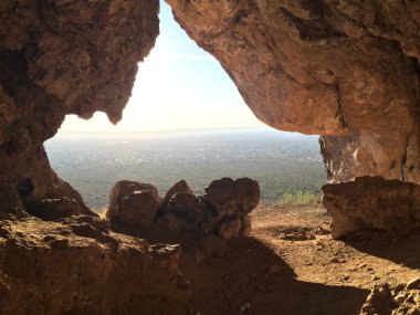 Broadway Cave Opening, Looking at the Phoenix Valley, Apache Junction, Arizona . High quality photo clipart