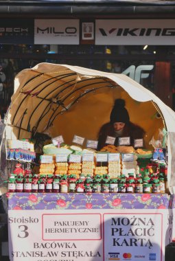 Smoked cheese Oscypek and local products, on a stall, on Krupowki street, Zakopane, poland