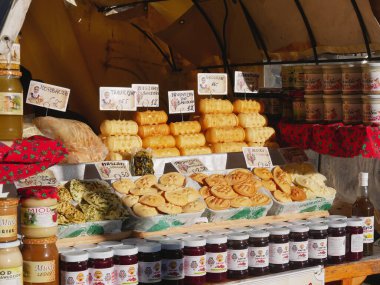 Smoked cheese Oscypek and local products, on a stall, on Krupowki street, Zakopane, poland