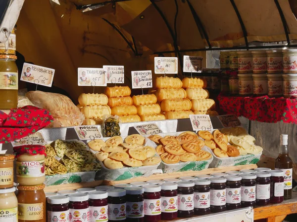 Smoked cheese Oscypek and local products, on a stall, on Krupowki street, Zakopane, poland