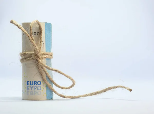 Euro Bills Rolled Tied Hemp String Cockade Knot White Background — Stockfoto