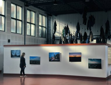 Walllers, France - 09 22 2024 : Exhibition of photographs in the hanging room of the Wallers Arenberg mine. clipart