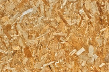 Yapı, DIY projeleri ve endüstriyel tasarım için ideal desenli ahşap parçaları olan oryantasyonlu iplik yüzeyine yakın plan..