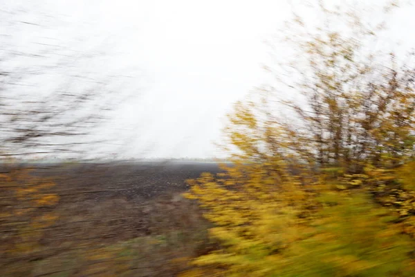 秋には スライド 道路上の写真は 移動中の車から 抽象的 — ストック写真