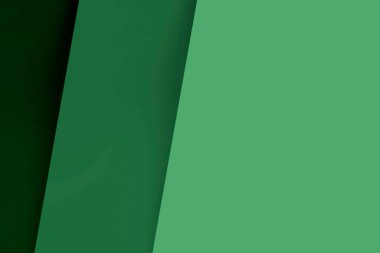 Yeşil ve mavi üçgenli soyut bir arkaplan. Pankart, poster, broşür, kapak tasarımı.