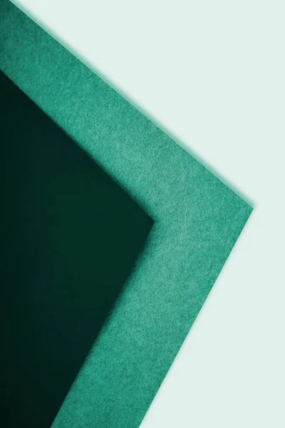 stock image Abstract vertical triangular papers on white background looks like side view of an open book plain vs textured cover