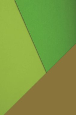 Yeşil, pastel rengi, düz yatay, üst görünümü olan kağıt sayfalarının soyut arkaplanı