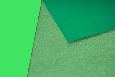 Renkli arka planda yeşil kağıt kağıtlar. soyut geometrik arkaplan.