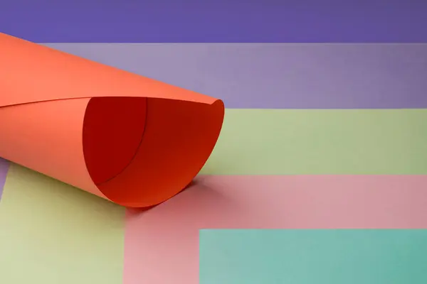Färgglada Papper Rullar Orange Bakgrund — Stockfoto
