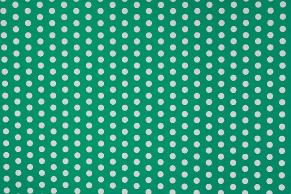 绿色背景上的Polka点图案 — 图库照片