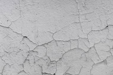 Doku, duvar, beton, arka plan olarak kullanılabilir. Çizik ve çatlaklarla dolu bir duvar parçası.