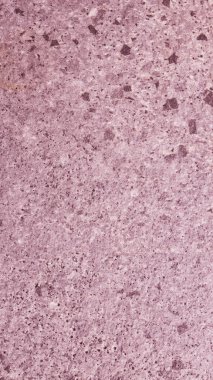 Pembe benekli granit yüzey dokusu