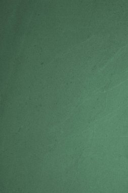 Koyu yeşil kağıt doku arka plan.