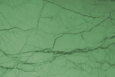 Tasarım ve dekoratif sanat çalışmaları için doğal taşlı yeşil mermer arka plan.
