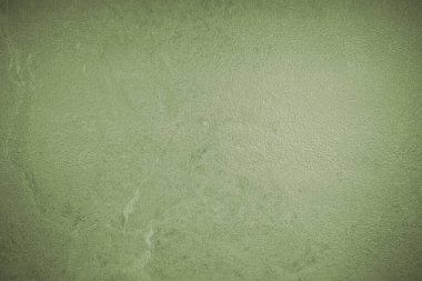 Eski yeşil duvar dokusunun soyut arkaplanı