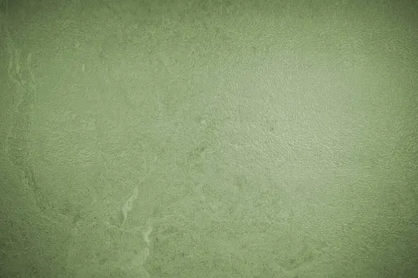 Eski yeşil duvar dokusunun soyut arkaplanı
