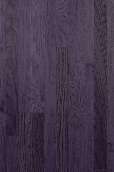 dark wooden background with dark purple texture, top view