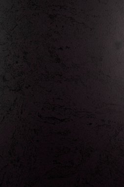 Web veya yazdırma dizaynı için doğal desenli koyu siyah doku arkaplanı.