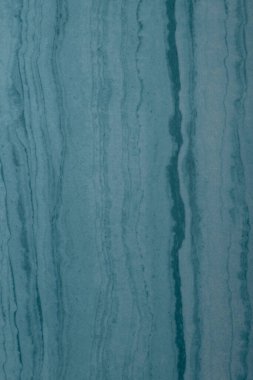 Mavi bir yüzeyin soyut dokusu