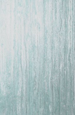 Alçı desenli beyaz beton duvar.