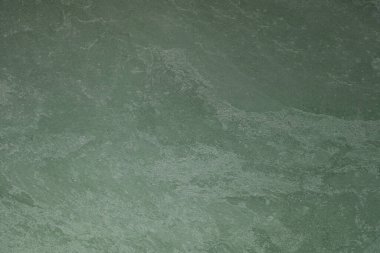 Koyu yeşil desenli duvar.