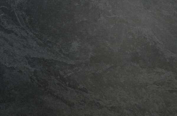 dark stone background or texture for design. black and grey colors.