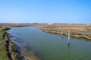 River flowing to the North Sea at The Zwin nature reserve, Knokke, Flanders, border between Belgium and The Netherlands, Europe