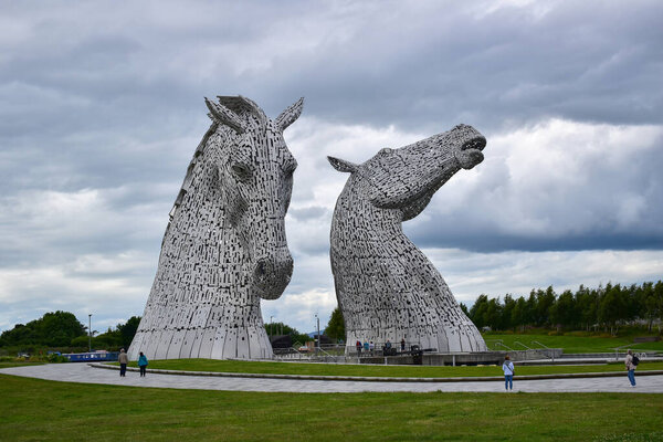Falkirk , United Kingdom - July 5, 2023 : The Kelpies horses statue by Andy Scot, Helix park, Scotland, United Kingdom, Europe