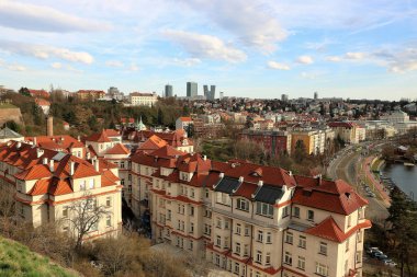 View from Vyehrad on Prague houses, in front are historical buildings, on the horizon are modern high-rice buildings