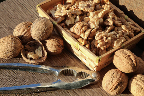 Walnuts - whole and shelled with a nutcracker