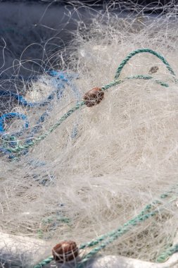Saintes-Maries-de-la-Mer, Bouches-du-Rhone, Provence-Alpes-Cote d'Azur, France. Fishing nets in the harbor of Saintes-Maries-de-la-Mer.