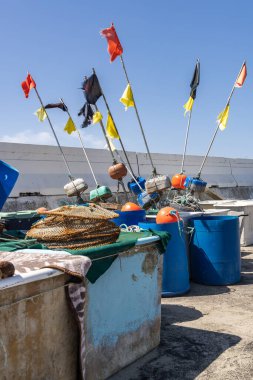 Saintes-Maries-de-la-Mer, Bouches-du-Rhone, Provence-Alpes-Cote d'Azur, France. Flagged fishing buoys in Saintes-Maries-de-la-Mer.
