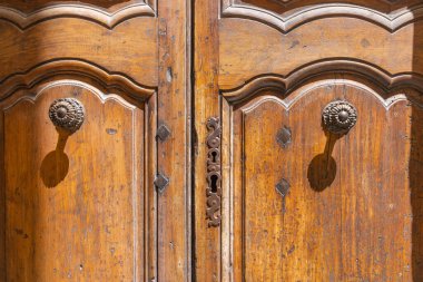 Gordes, Vaucluse, Provence-Alpes-Cote d'Azur, France. An old wooden door in Provence.