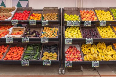 Saintes-Maries-de-la-Mer, Bouches-du-Rhone, Provence-Alpes-Cote d'Azur, France. July 3, 2022. Fresh fruit for sale at a market in Provence.