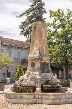 L'Isle-sur-la-Sorgue, Avignon, Vaucluse, Provence-Alpes-Cote d'Azur, France. July 6, 2022. Monument to Alphonse Benoit in L'Isle-sur-la-Sorgue.