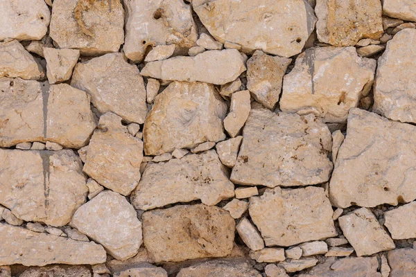 Middle East, Saudi Arabia, Tabuk, Duba. Detail of a dry stone masonary wall.