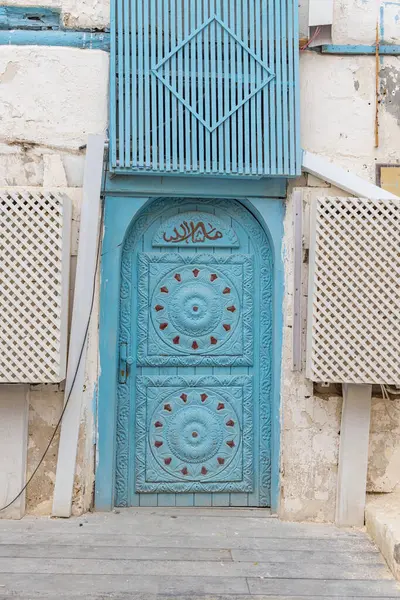 Middle East, Saudi Arabia, Mecca, Jeddah, Al-Balad. Door on a traditional Hijazi tower house in the Al-Balad historical district.