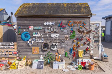 Amble, Morpeth, Northumberland, England, Great Briton, United Kingdom. May 1, 2022. Signs for sale on a wooden shed. clipart