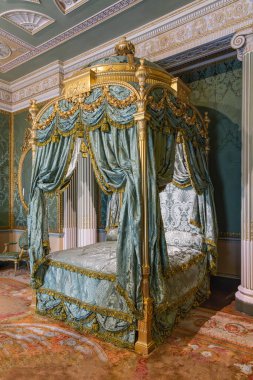 Harewood, Leeds, West Yorkshire, England, Great Briton, United Kingdom. May 2, 2022. Canopy bed in Harewood House, an 18th Century Treasure House. clipart