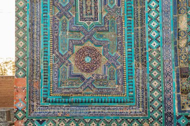Samarkand, Samarqand, Uzbekistan, Central Asia. Decorative tile work at the Ustad Ali Nasafi Mausoleum at the Shah-i-Zinda in Samarkand. clipart