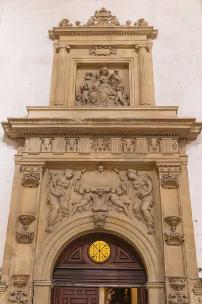 stock image Albaicin, Granada, Province of Granada, Andalusia, Spain. April 26, 2023. Decorations above an entrance to the Granada Cathedral.