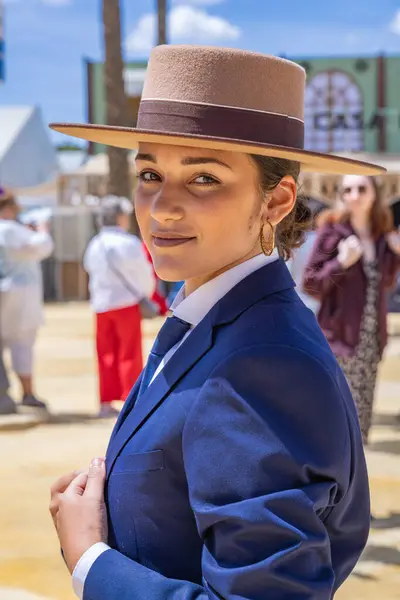 stock image Jerez de la Frontera, Cadiz, Andalusia, Spain. May 7, 2023. Woman in traditional dress at the Jerez Horse Fair, known as the Feria del Caballo.