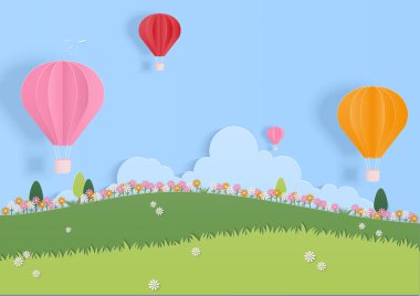 Bahar ve yaz arkaplanı. Çiçek tarlası ve gökyüzünde sıcak hava balonu olan çayır. Kağıt sanatı tarzı.