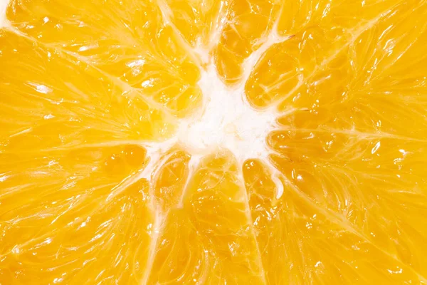 Orange texture as a background. Close up shot of a orange flesh. Macro photo.