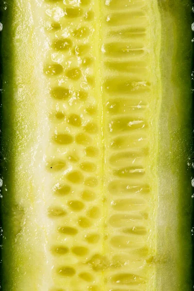 Cucumber as a background. A close shot of a cucumber. Macro photo. Cucumber. Close-up