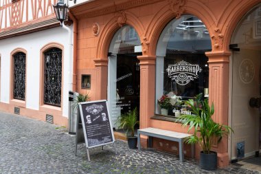 Mainz, Germany. July 2, 2024. Barbershop with an old facade clipart