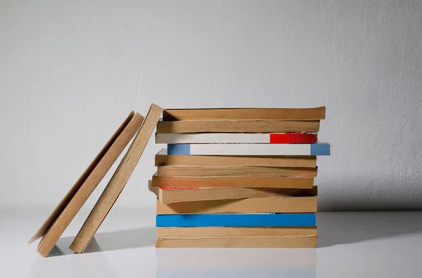 Stack of old books with white background. International book day concept. Novel reading
