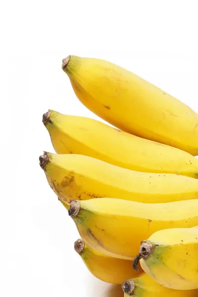 stock image One large bunch of ripe Raja bananas (Musa acuminata), with a vibrant yellow color, photographed against a white background.