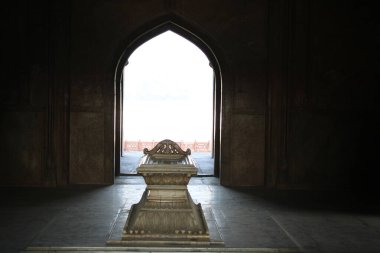 the old wooden door in the city of the ancient mosque in the evening