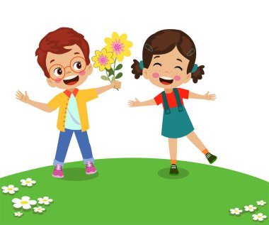 Sevimli çocuk arkadaşına çiçek veriyor.